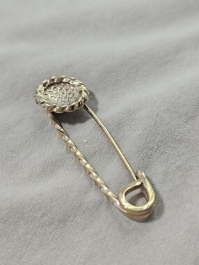 Gold Safety Pin Brooch with Textured Medallion